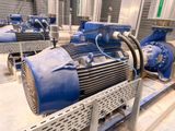 a blue machine that is sitting on a pallet