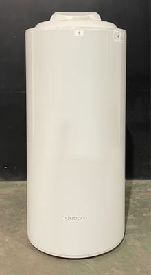 a white air purifier sitting on a counter