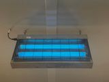 a blue light that is hanging from the ceiling