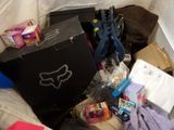 a black box with a fox logo on it sitting on a bed