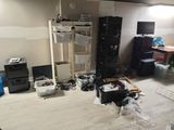 an image of a room with a lot of stuff on the floor
