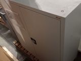 an image of a white cabinet in a garage