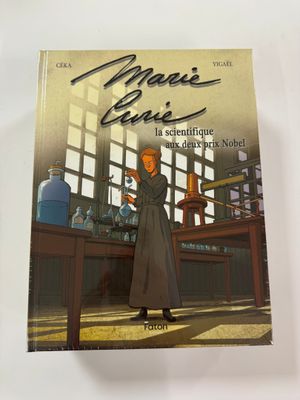 an image of a book with a picture of a woman standing in front of a table