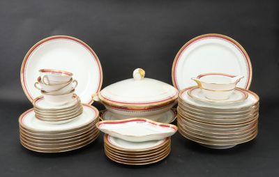 a lot of plates and cups on the table