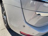 a close up of a car ' s rear bumper