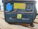 a blue machine sitting on top of a wooden table