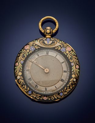 une montre de poche ancienne en or, avec un motif floral sur le cadran