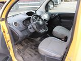 a small yellow car with a steering wheel and a dashboard