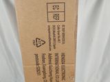 a cardboard box with a brown label on it