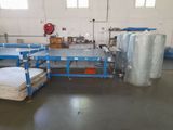 a room with a lot of mattresses on the floor