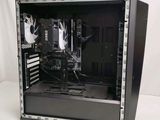 a black computer case sitting on top of a white table