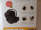 the box of the baby car seat is open on the counter