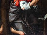 an image of a painting of a man kneeling in the woods