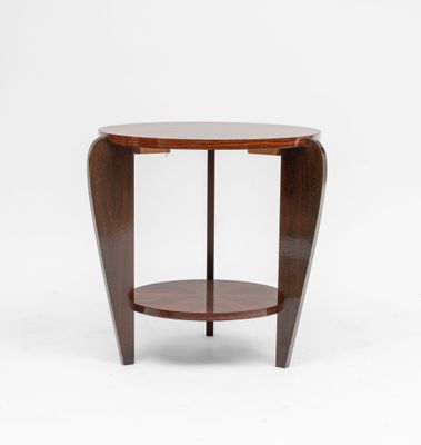 a round side table with a wooden top and two shelves
