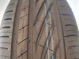 a close up of a car tire with a blue line painted on it