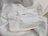 a piece of fabric with writing on it