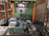 a machine that is working on a piece of metal