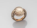 a gold and diamond ring