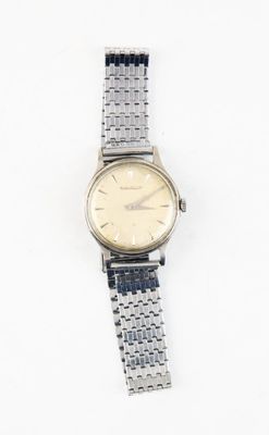 an image of a silver and blue watch on a white surface
