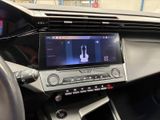 the dashboard of a car with a digital display in the center