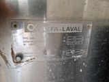 une photo d'une cuve en acier inoxydable sur laquelle est apposée une pancarte