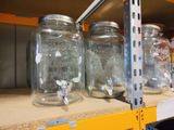 many jars on a shelf in a store