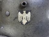 a close up of a helmet with an eagle on it