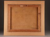 an old picture frame with a wooden frame on a white surface