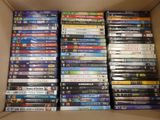 a lot of dvds in a box on the table