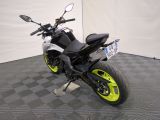 a picture of a motorcycle that is parked in a garage