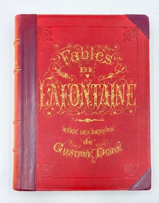 the front cover of a red book with gold lettering on it