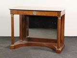 a small table with a mirror on top of it
