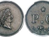 a close up of a coin with the word p g on it