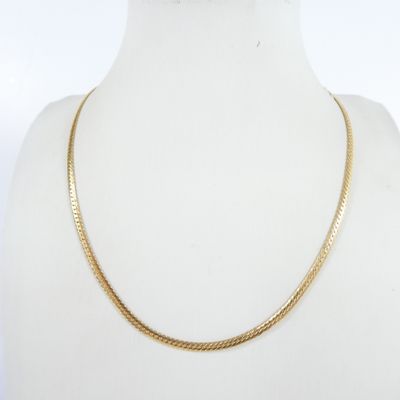 a gold chain necklace on a mannequin mannequin mannequin mannequin mannequin mannequin mannequin mannequin manne