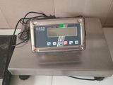 a digital scale sitting on top of a counter