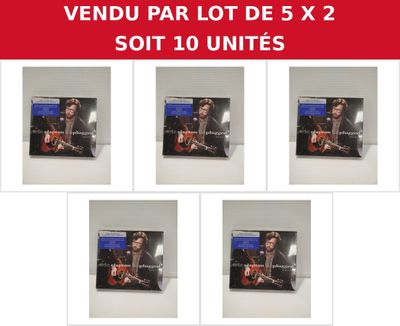 six different pictures of a man playing a guitar in front of a tv