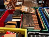 a lot of books that are sitting on a table