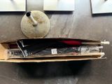 a cardboard box with a bunch of items inside of it