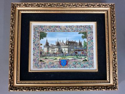 painting of a castle in a gold frame on a wall