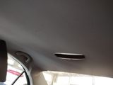 the interior of a car with the sun shining through the window