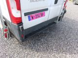 a white van parked on the side of the road