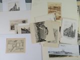 a lot of drawings and pictures on the table