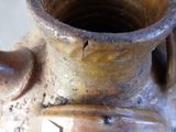 a close up of a vase with a number on it