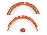 an image of a pair of red and gold ear clips