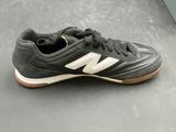 a close up of a pair of shoes on a floor