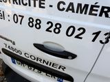 a white van that is parked on the side of the street