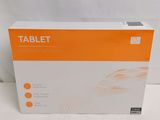 a white box with orange writing on it sitting on a table