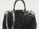 Sac à main Louis Vuitton en cuir noir à motif Monogramme, avec finitions dorées