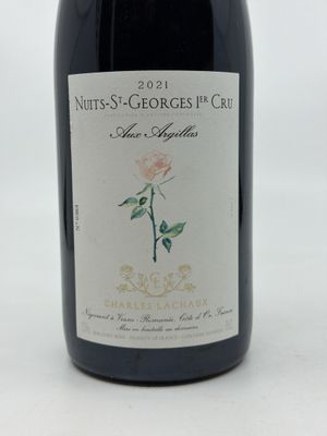 a bottle of wine that is sitting on a table