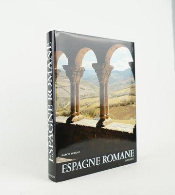 the front cover of a book with an image of a man sitting on a stone wall